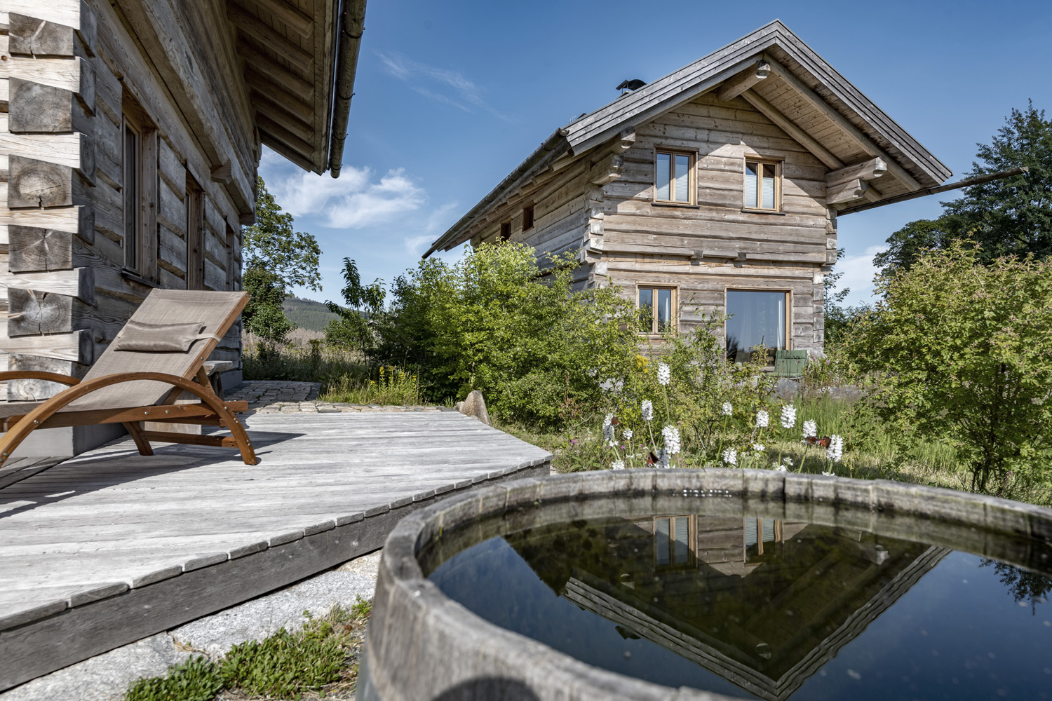 Blockhäuser im Harz mit Terrasse und Regentonne